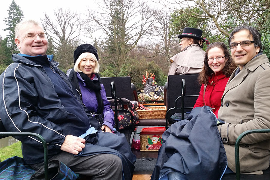 Guests aboard the carriage on a Winter tour